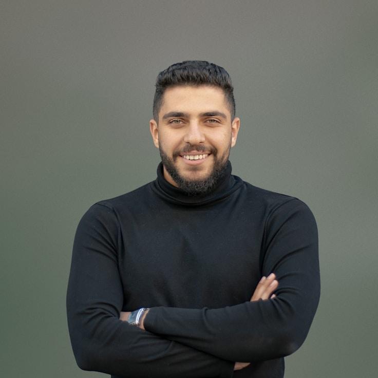 Kaveri Mehta, Lead Design Curator at RippleForestGlint, reviewing corporate floral arrangements